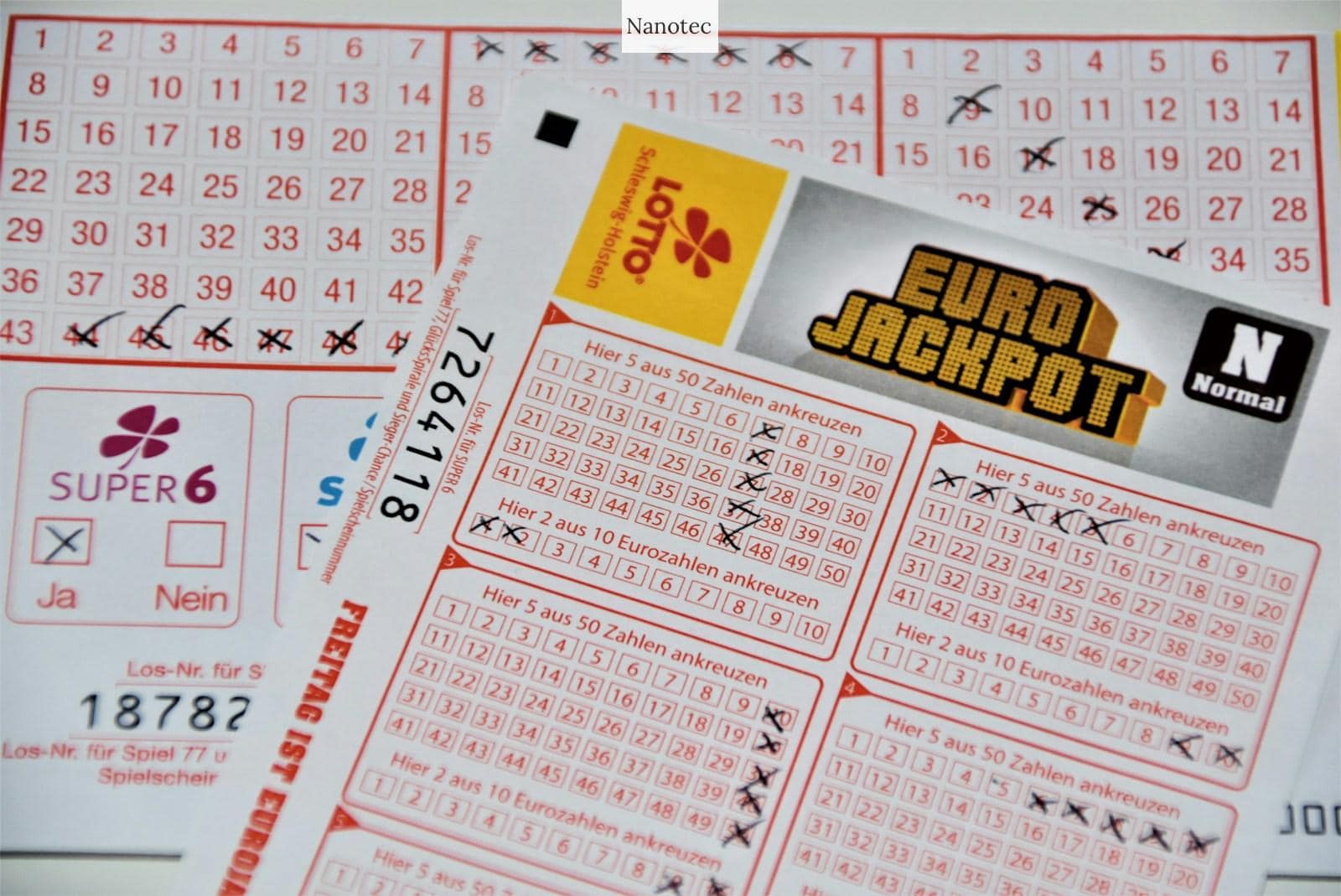 white and red calendar on white wall