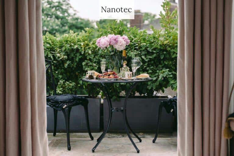 Charming outdoor table with peonies and wine, perfect for a summer brunch.