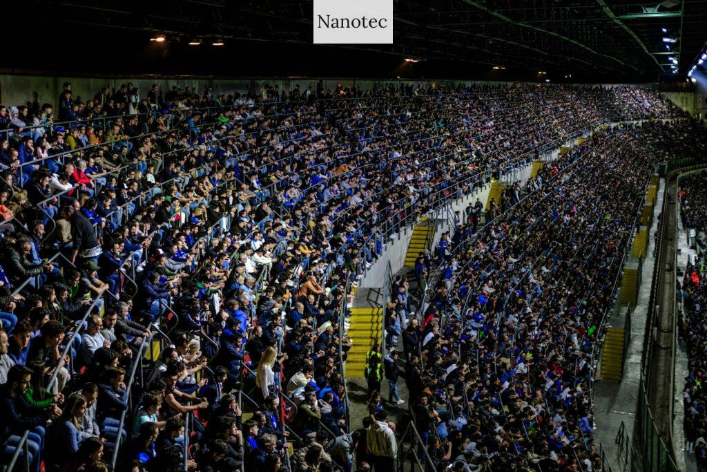 a large crowd of people in a stadium