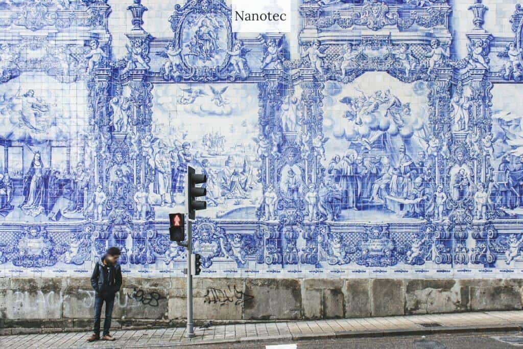 man standing near traffic lights