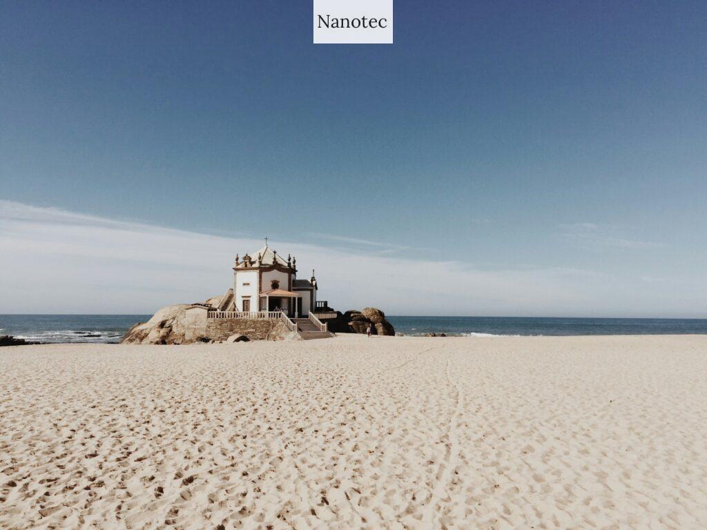 white concrete castle on beach