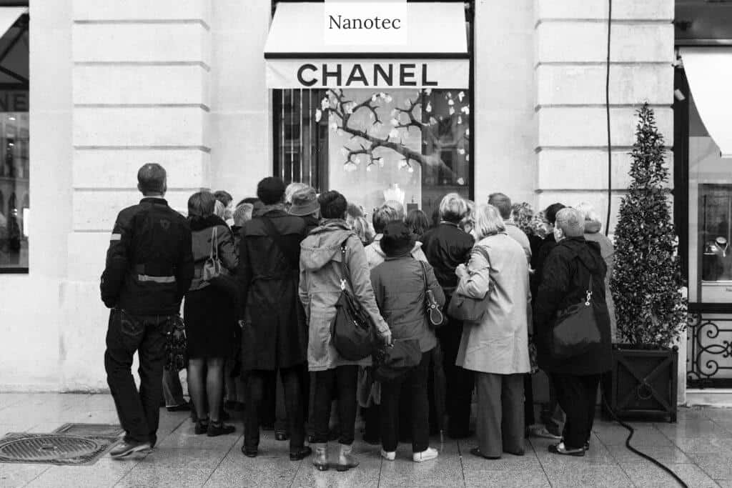 People gather to look at the chanel store.